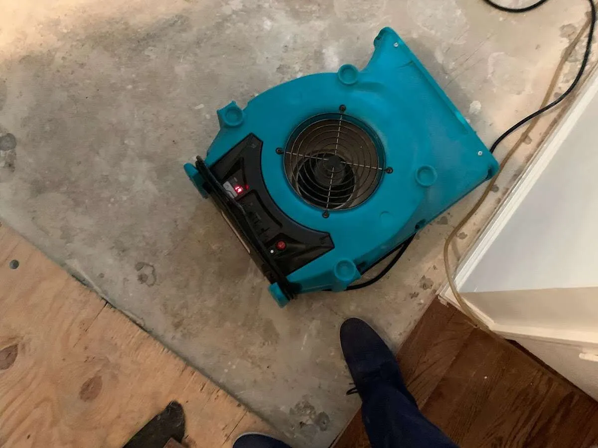 Air mover drying subfloor during Leak Detection & Repair in McKinney